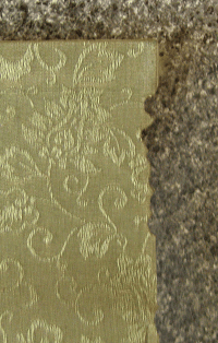 Tears at the top part of the mounting